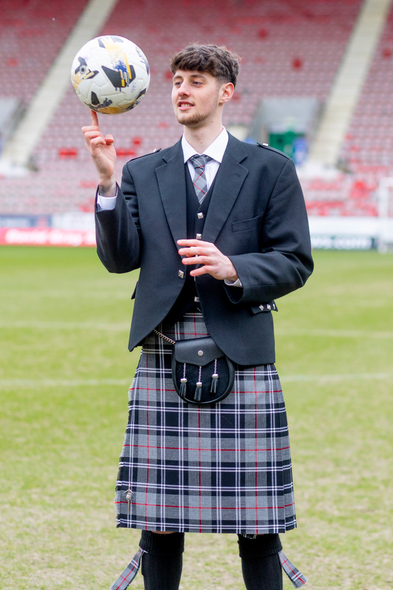Billy Terrell in a Pars Tartan Highland Outfit