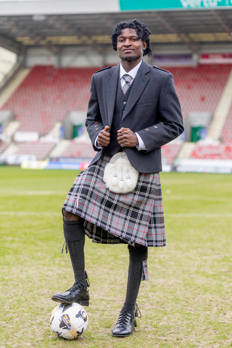 Nurudeen Abdulia in a Pars Tartan Highland Outfit